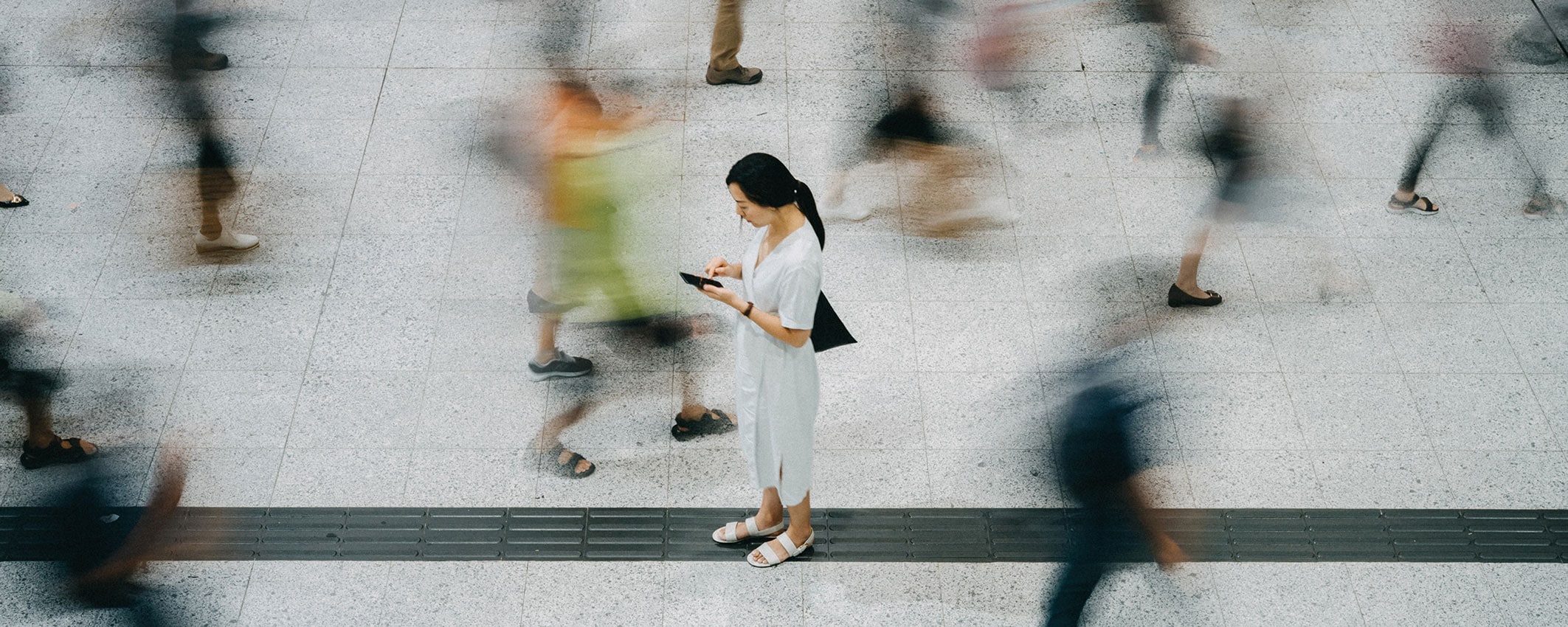 fifth-estate-action-walking-woman-phone