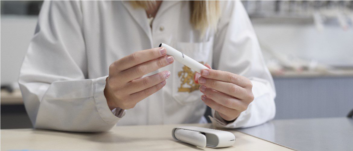 scientist-with-iqos-holder