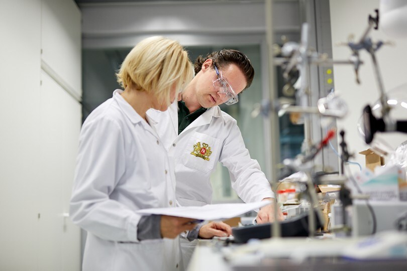 Researchers working together in a laboratory.
