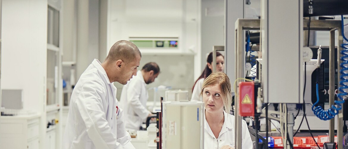 Scientist in a laboratory small banner 2016