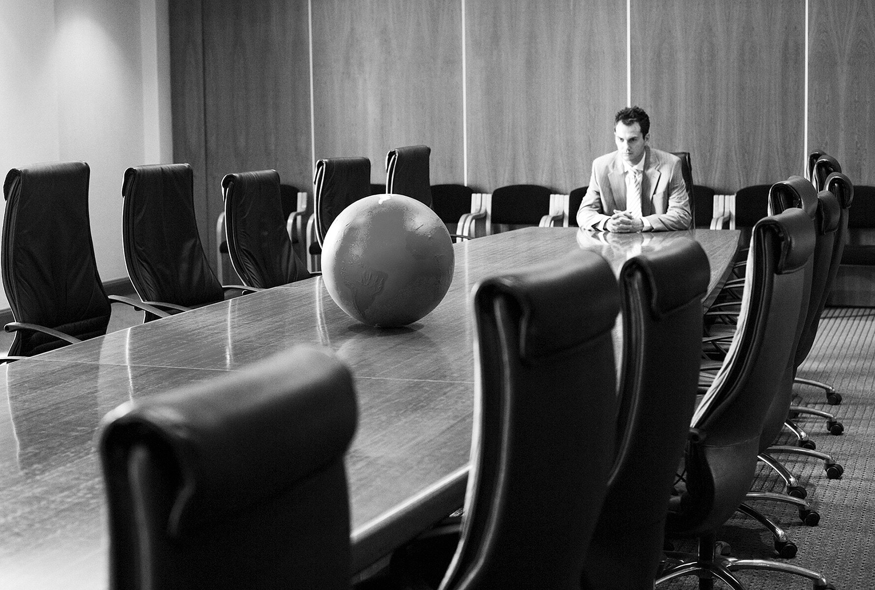 man-sitting-in-boardroom