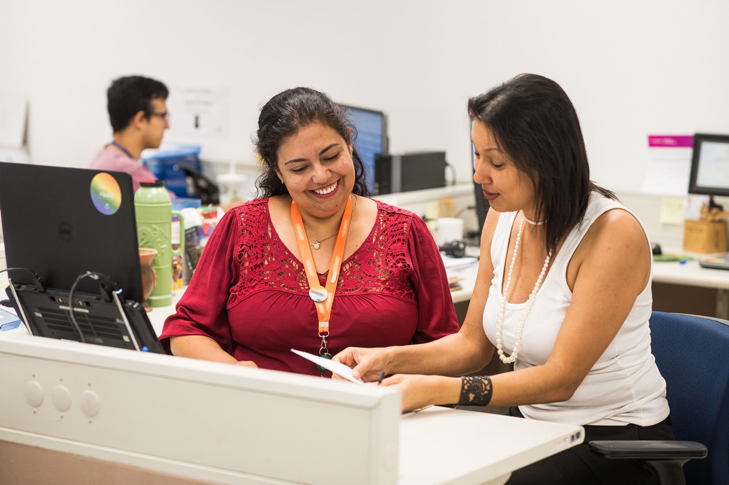 colleagues chatting in an office