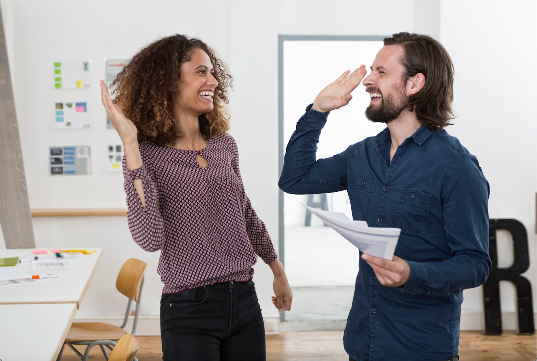 two people giving high five